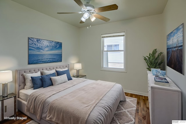 7336 S 71st Ave, Omaha, NE 68128 - bedroom featuring wood finished floors and a ceiling fan