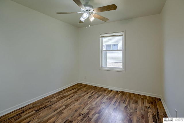 7336 S 71st Ave, Omaha, NE 68128 - unfurnished room with wood finished floors and ceiling fan