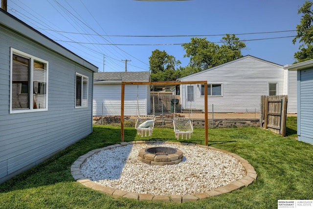 7336 S 71st Ave, Omaha, NE 68128 - view of yard featuring an outdoor fire pit