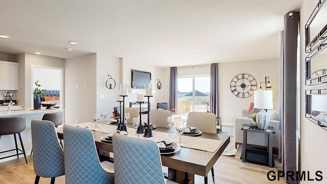 dining area featuring light hardwood / wood-style floors