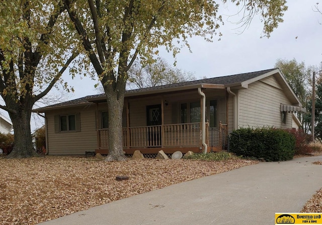 ranch-style house with a porch