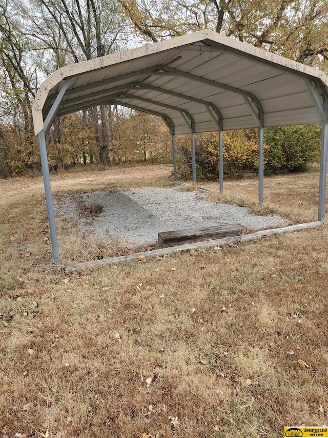 view of vehicle parking with a carport