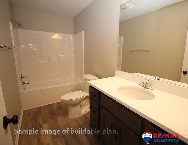 full bathroom with tub / shower combination, wood-type flooring, a textured ceiling, toilet, and vanity