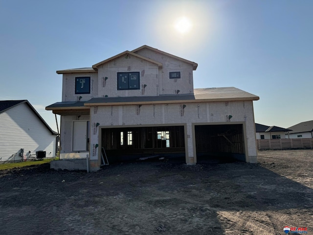 property under construction featuring a garage