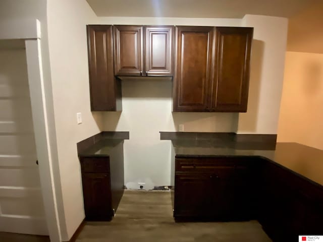 kitchen with dark brown cabinetry