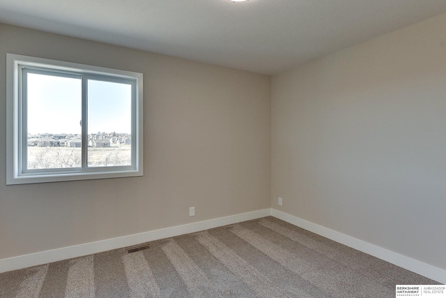 view of carpeted spare room