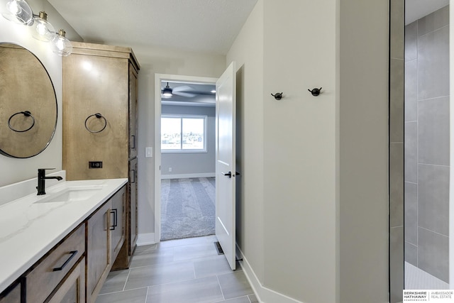 bathroom with vanity and tile patterned flooring