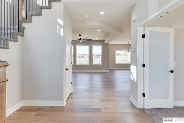 hall with light hardwood / wood-style flooring