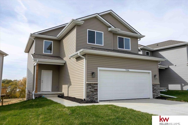 craftsman inspired home featuring a front yard and a garage