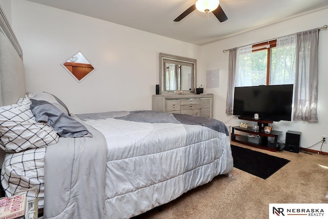 bedroom featuring ceiling fan and carpet floors