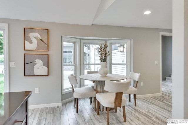 dining space featuring light hardwood / wood-style floors