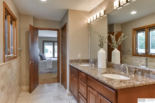 bathroom with vanity and tile patterned flooring