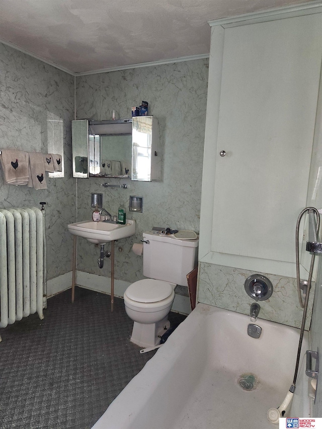 full bath with radiator, toilet, a washtub, crown molding, and a sink