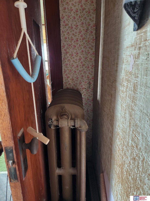 interior details featuring wallpapered walls