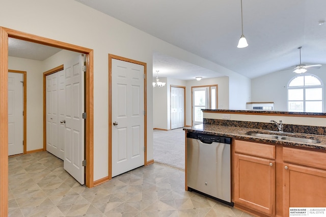 kitchen with dishwasher, a healthy amount of sunlight, sink, and pendant lighting