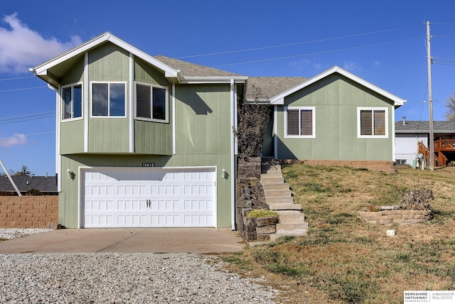 view of front of property with a garage