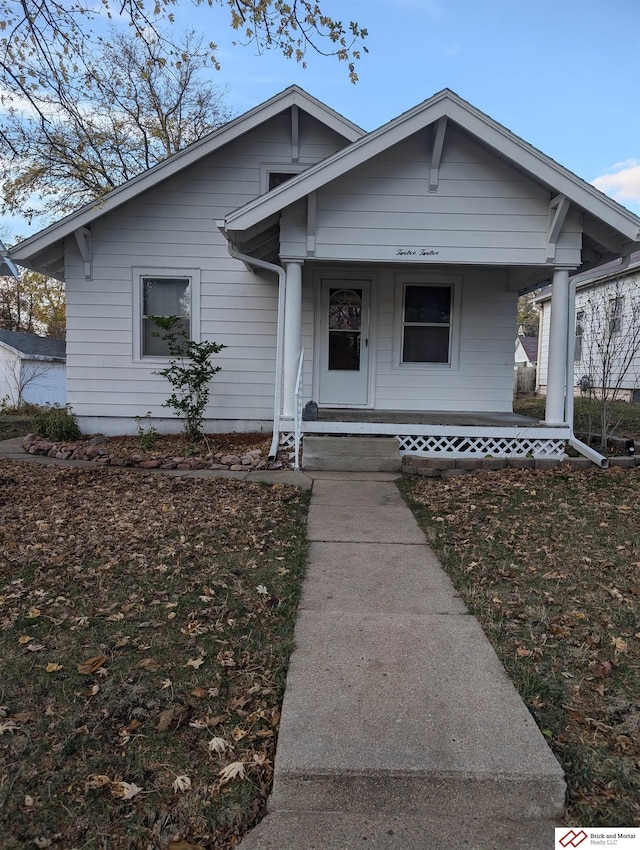 bungalow-style house featuring covered porch