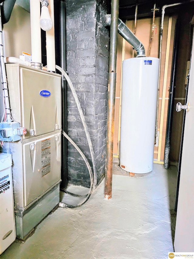 utility room featuring gas water heater