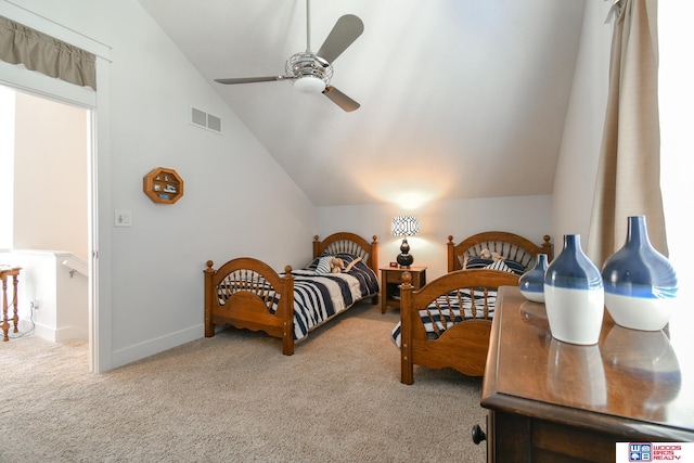 carpeted bedroom featuring vaulted ceiling and ceiling fan