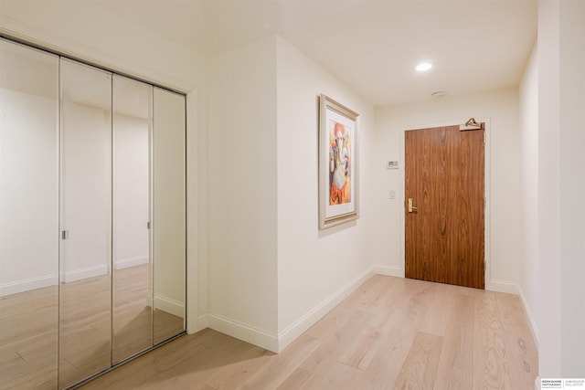 hallway featuring light hardwood / wood-style floors