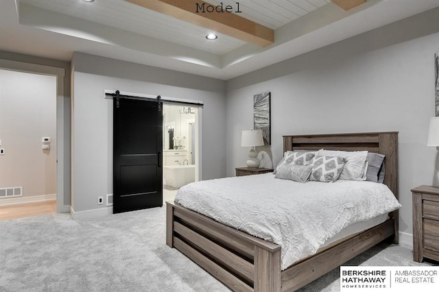 3902 S 212th St, Omaha, NE 68022 - bedroom featuring a tray ceiling, a barn door, light colored carpet, recessed lighting, and baseboards