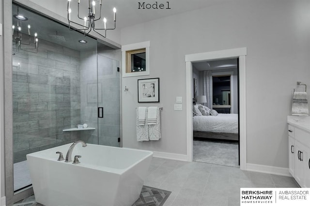3902 S 212th St, Omaha, NE 68022 - full bathroom featuring vanity, baseboards, a freestanding bath, and a stall shower