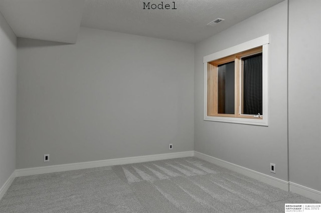 3902 S 212th St, Omaha, NE 68022 - carpeted spare room featuring baseboards and a textured ceiling