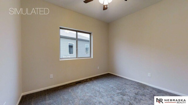 empty room with carpet and ceiling fan