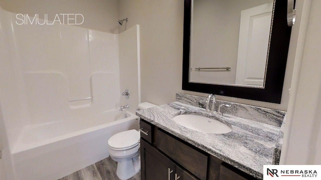 full bathroom featuring vanity, toilet, bathtub / shower combination, and wood-type flooring