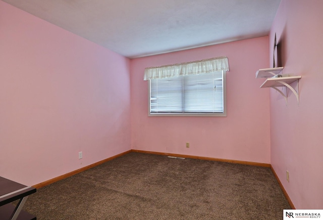 view of carpeted spare room