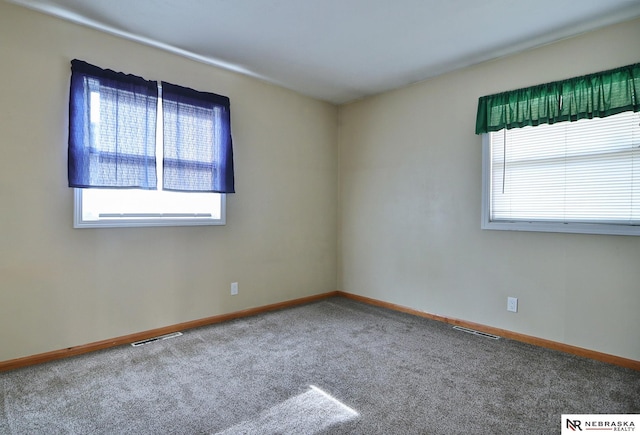 view of carpeted spare room