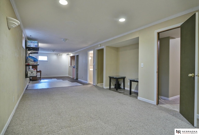 interior space featuring ornamental molding and carpet floors