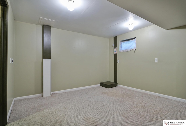 basement with light colored carpet