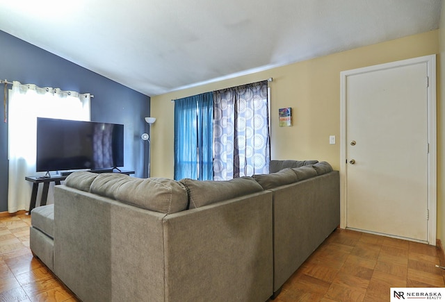 living room featuring parquet flooring