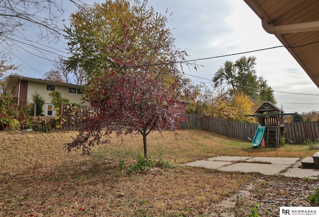 view of yard featuring a playground