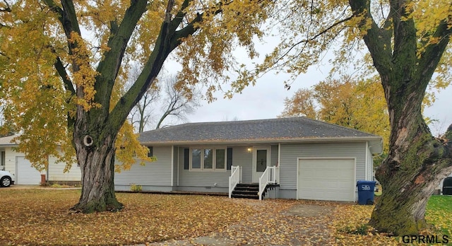 ranch-style home with a garage