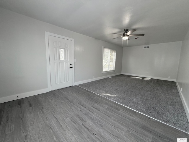 interior space featuring hardwood / wood-style floors and ceiling fan