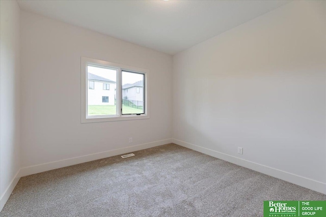 view of carpeted spare room