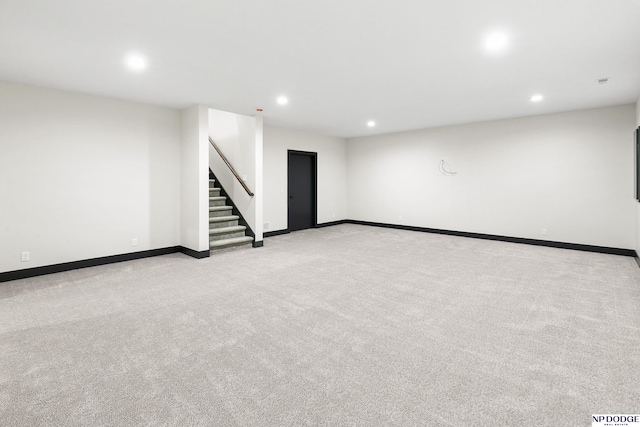 basement with light carpet