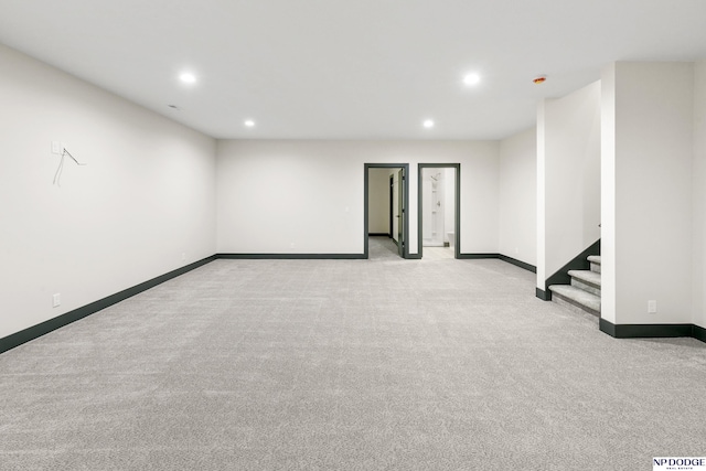 interior space featuring light colored carpet