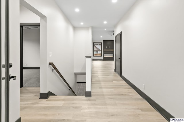 hallway featuring light hardwood / wood-style flooring