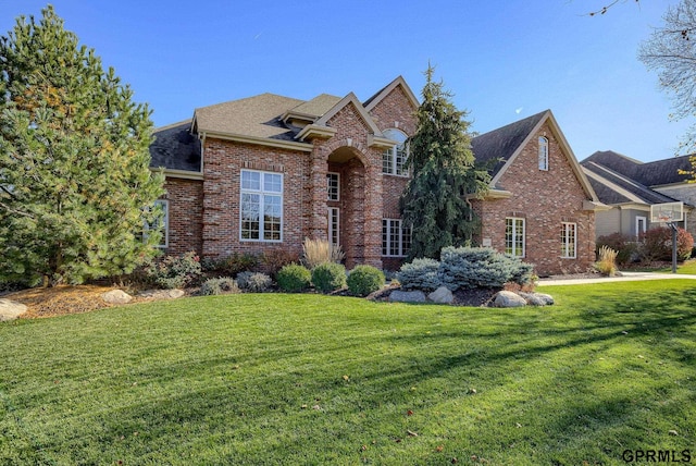 view of property with a front lawn