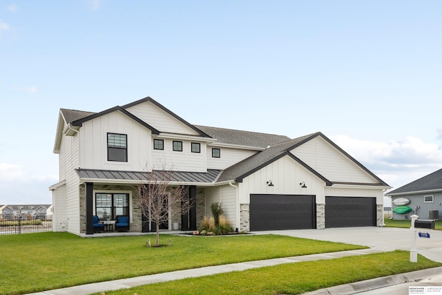 modern farmhouse with a garage and a front yard