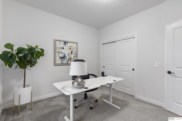 view of carpeted office space