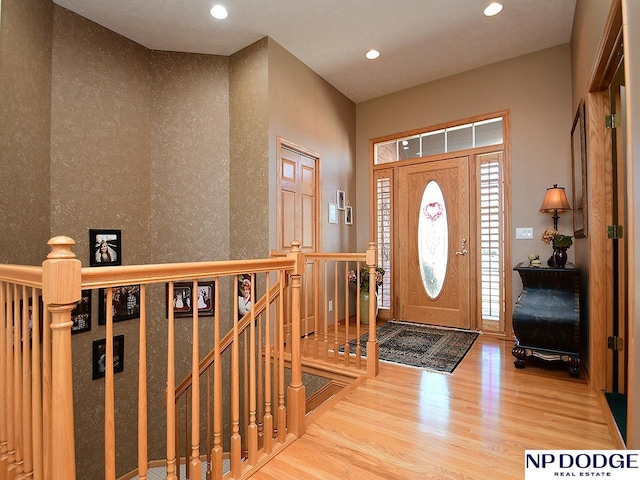 entrance foyer with hardwood / wood-style floors