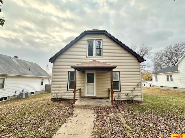 view of front of house featuring central AC unit