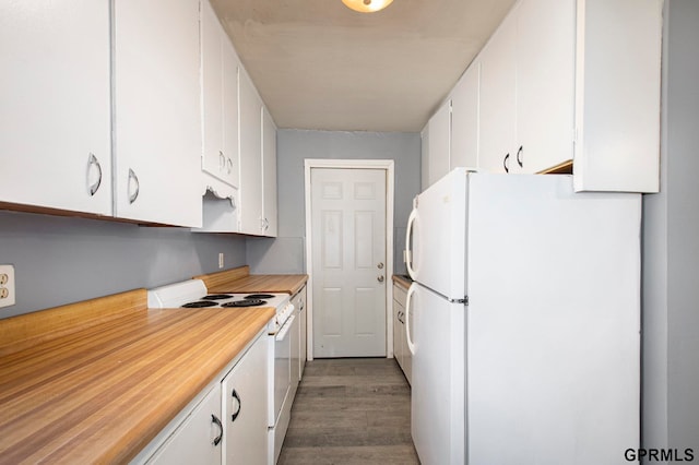 kitchen featuring white appliances, white cabinetry, and hardwood / wood-style flooring