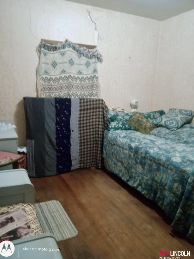 bedroom featuring hardwood / wood-style floors