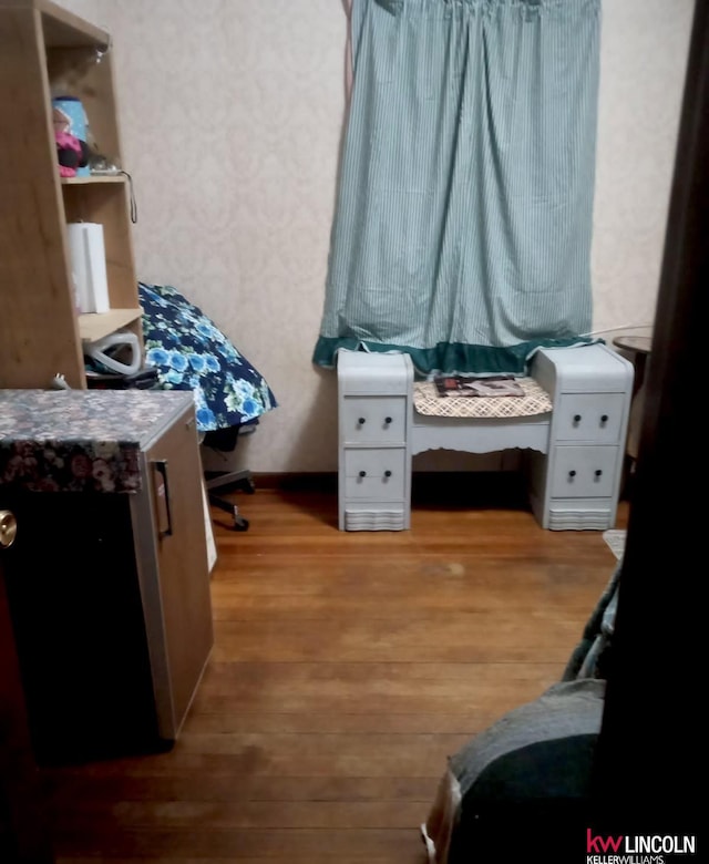 bedroom featuring light wood-type flooring