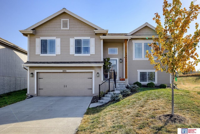 view of front of property with a garage and a front yard